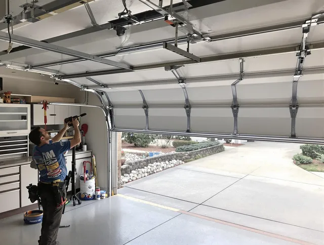 Garage door track repair service by Lake Forest Garage Door Repair in Lake Forest